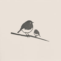 Robin and Chick by Metalbird Australia features a minimalist depiction of a large robin and a small chick perched on a branch—ideal for subtle bird garden decor against a plain, light background.