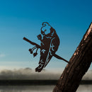 The Metalbird Australia Gang-Gang Cockatoo is a Corten steel bird decor featuring the parrot's silhouette perched on a branch, making it the perfect Australian gift for bird lovers.